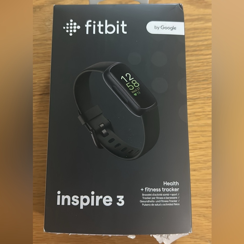 Fitbit Black Smartwatch with Sleek Design and Color Display